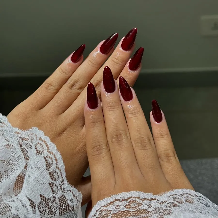 Glossy Maroon Almond Nails